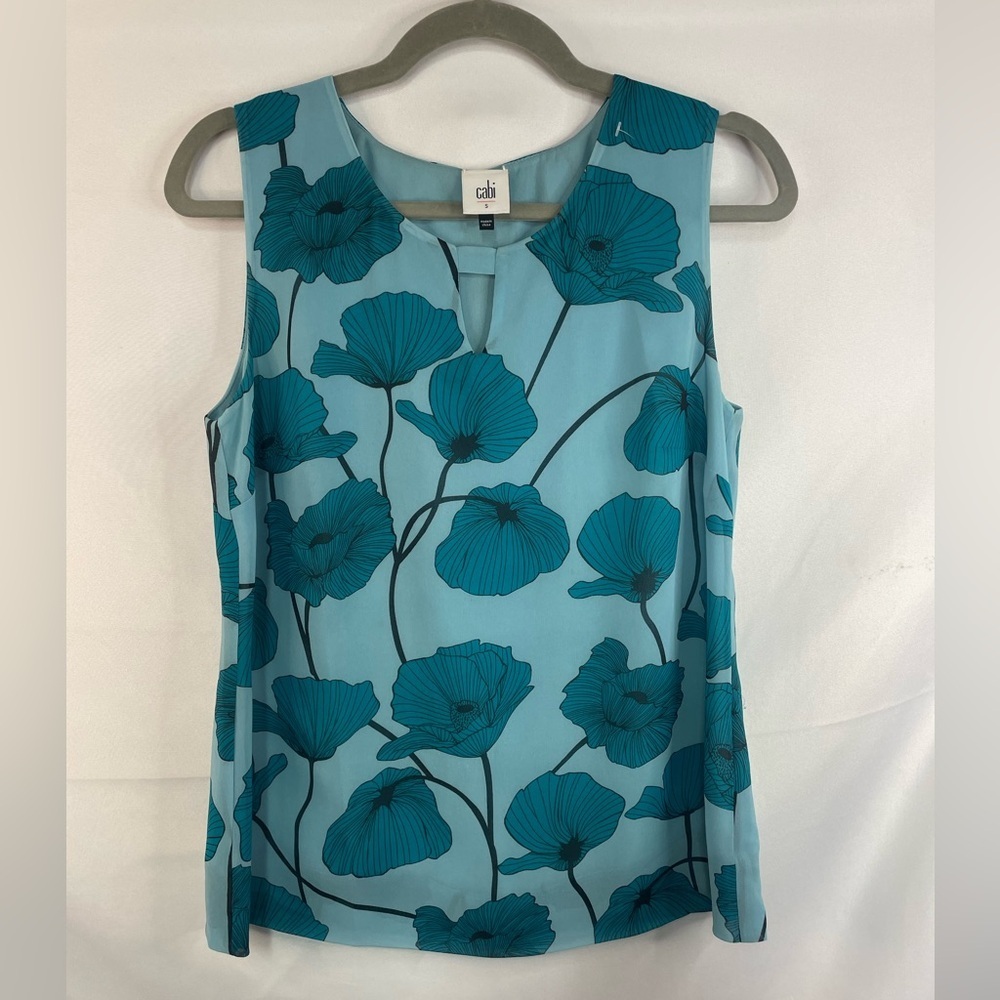 Cabi turquoise floral blouse, this is lined and light weight.